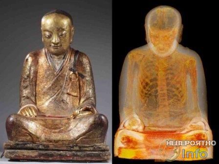 Тело человека внутри статуи Будды